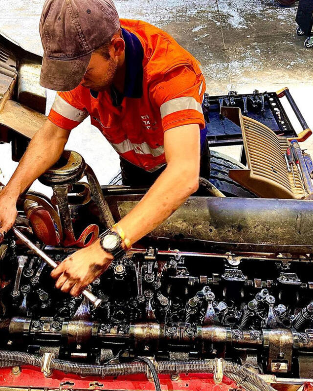 Geelong diesel mechanic working on machine engine