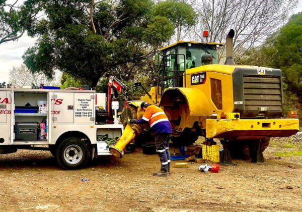 Hydraulics being repaired on heavy equipment by a Geelong diesel mechanic